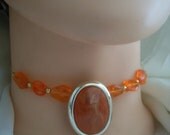 Choker. Recrafted. Vintage earring and beads. Orange.