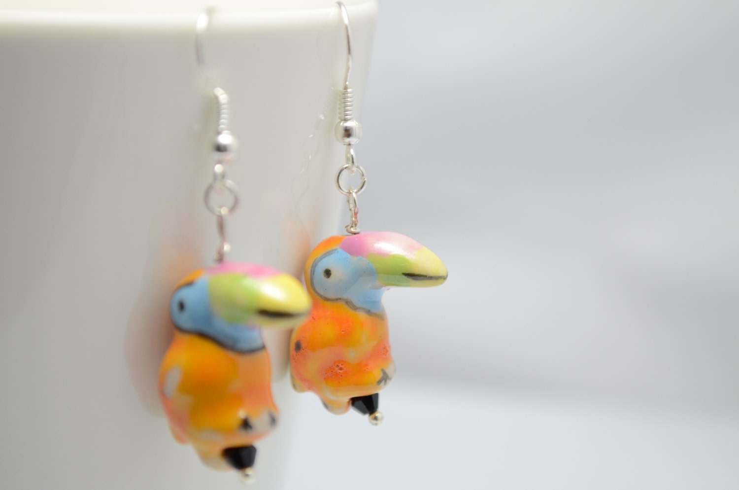 Orange toucan earrings ceramic toucan with silver hook