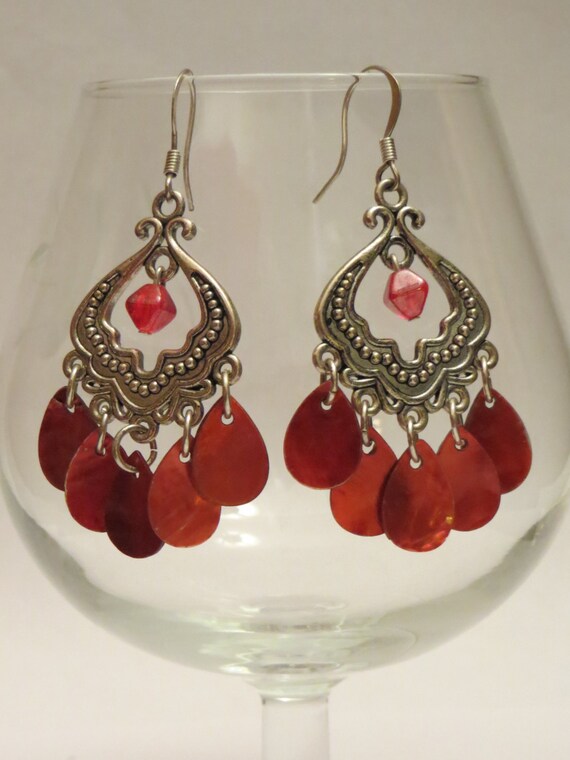 Beautiful chandelier earrings with red mother of pearl drops.