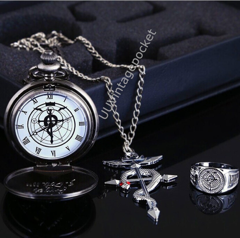 Titanium steel Fullmetal Alchemist three-piece. Fullmetal Alchemist pocket watch with Fullmetal Alchemist necklace and ring