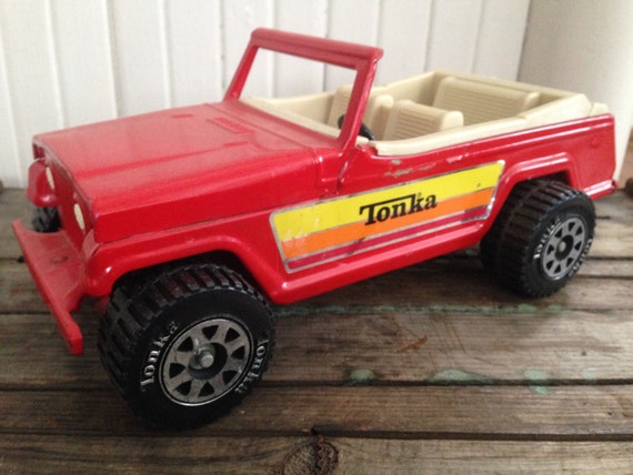 Vintage Tonka Red Metal Jeep Jeepster Toy by whatafindantiques