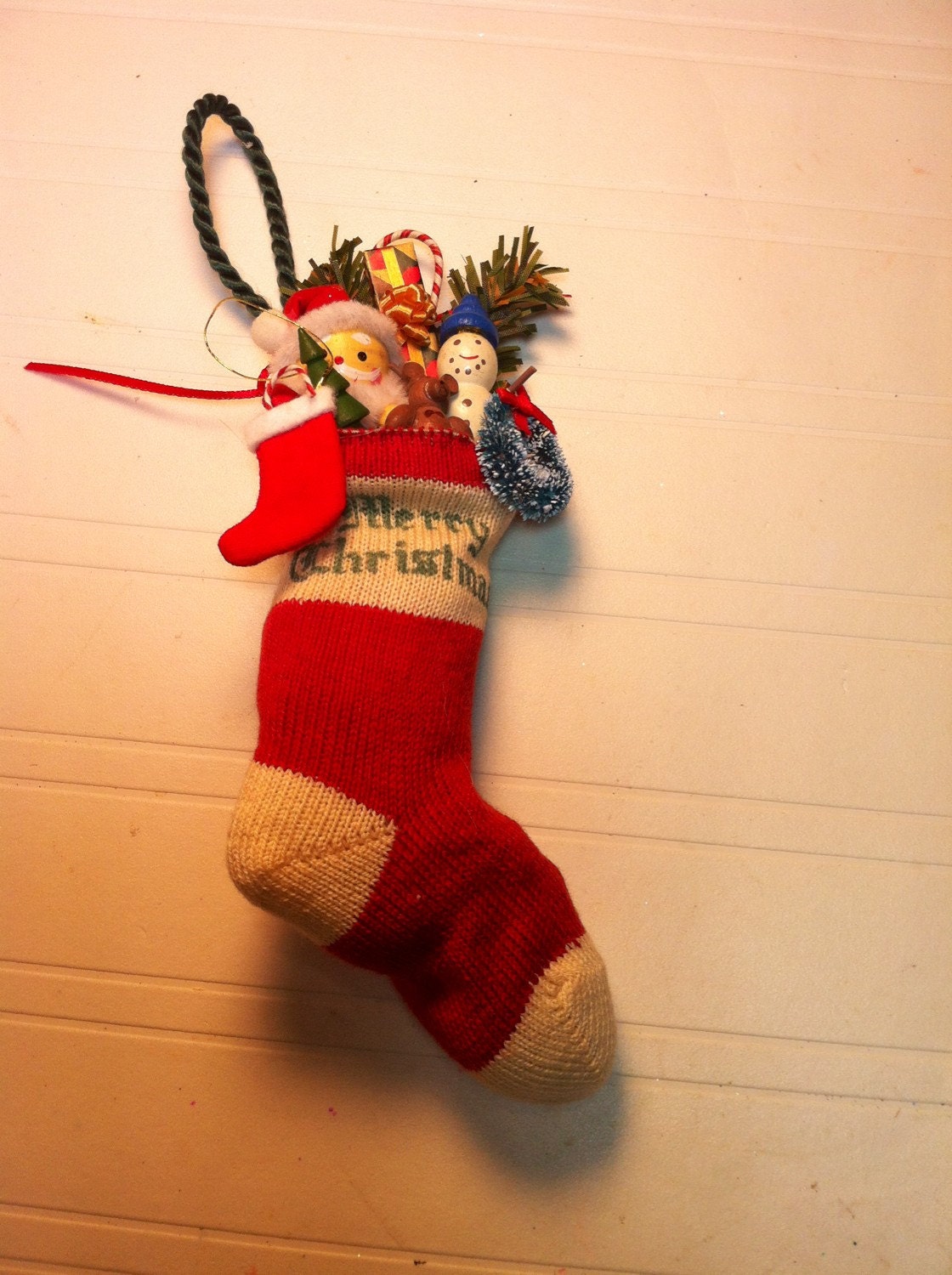 Small Vintage Christmas stocking and wood figure collectables