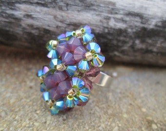 Bague de Cristal Swarovski et acier inoxydable dans les tons de vert, turquoise et mauve