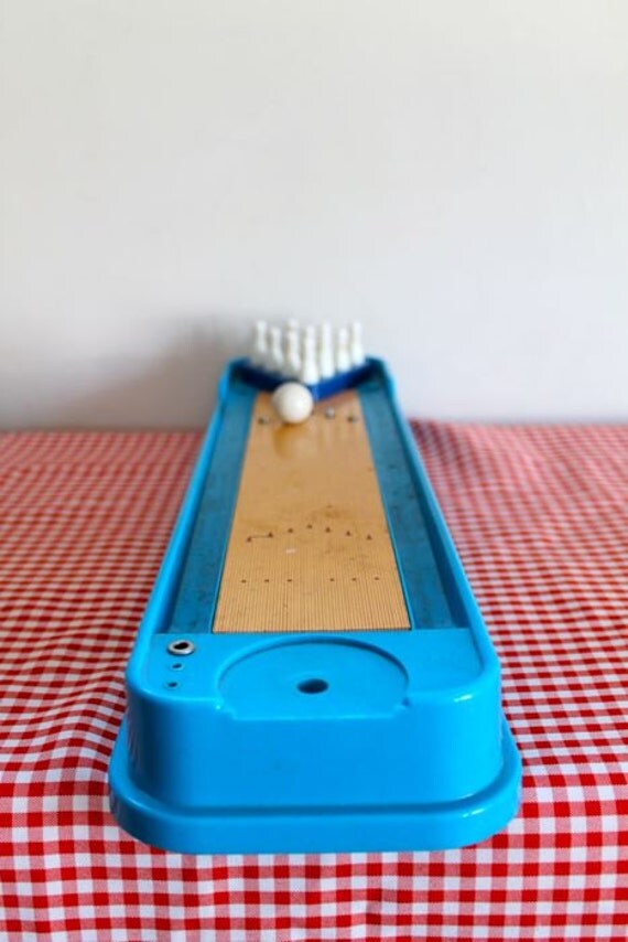 Items similar to vintage 1960s bowling game TOMY 60s bowling toy on Etsy
