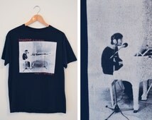 Popular items for john lennon t shirt on Etsy