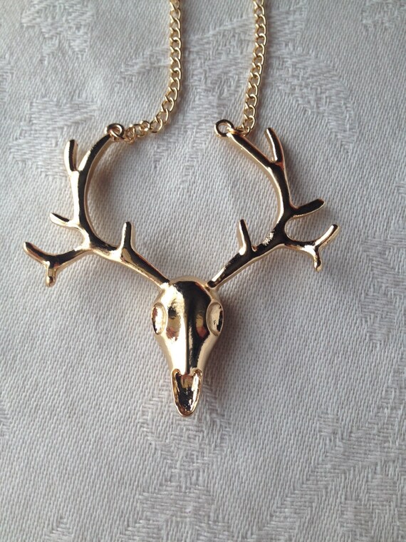 Gold deer necklace by KitschKats on Etsy