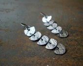 black silver earrings. sterling silver dangle earrings. textured silver. modern long earrings.half moon earrings. metalwork artisan handmade