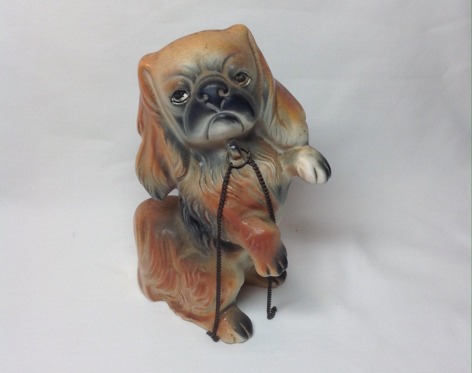 porcelain pekingese figurines