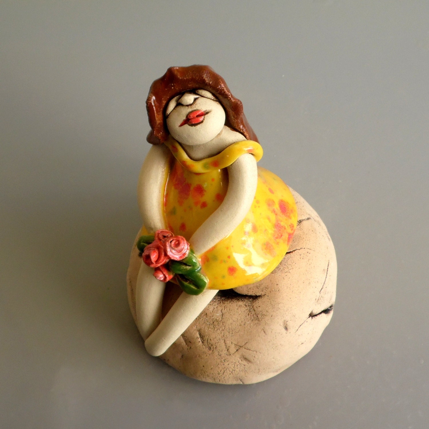 Ceramic sculpture of a young girl Clay female figure girl