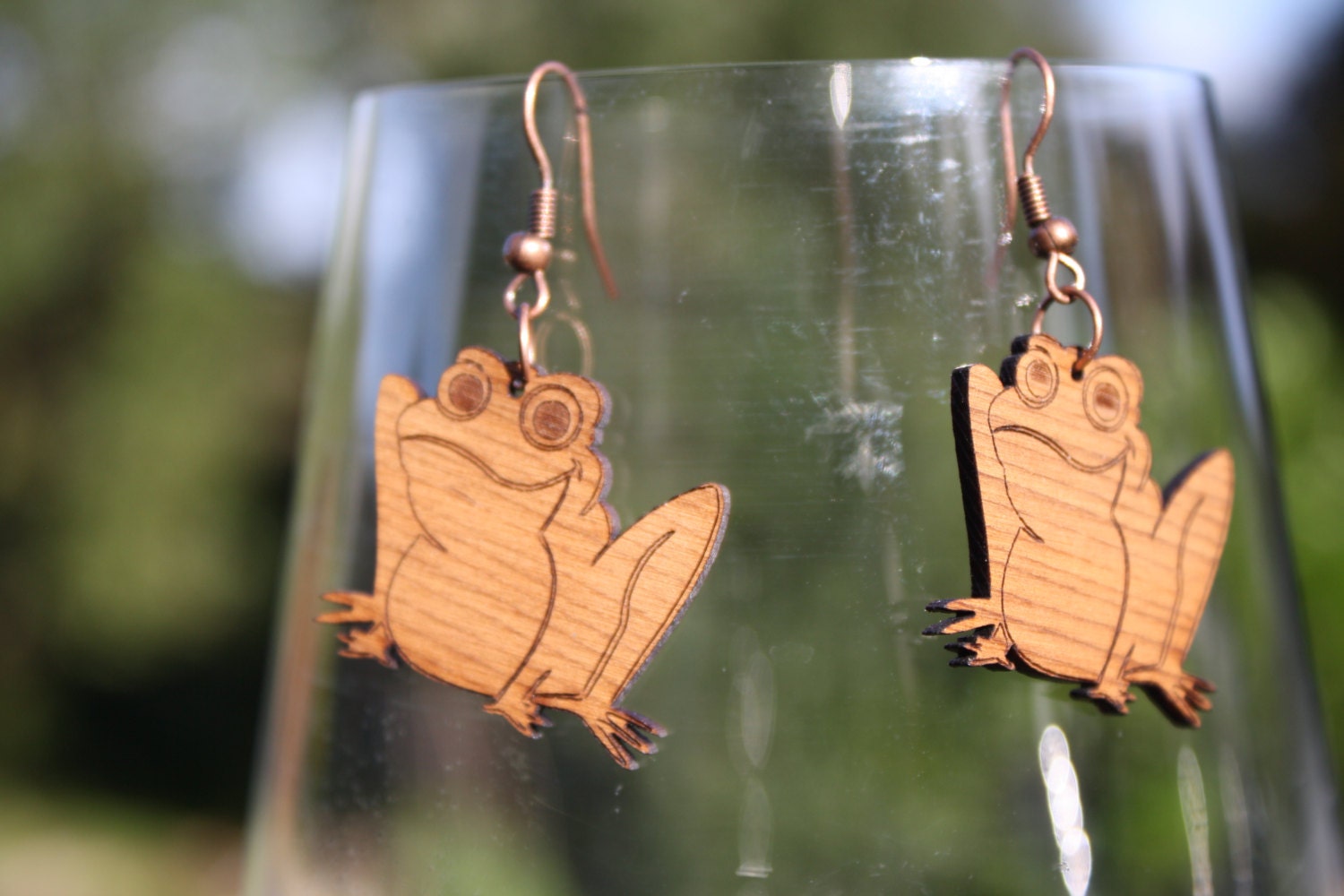 Lasercut frog earrings by MultiverseDesignsNZ on Etsy
