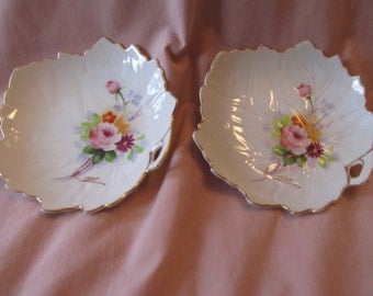 Se tof two leaf shaped dishes/ handpainted multi colored floral design/ gold trim