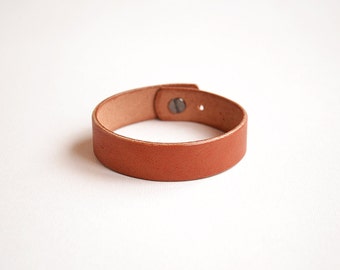 Leather Bracelet Tan Simple. Made by hand from genuine leather. Small Minimal Minimalistic Rounded and polished edges. Taffer Leather Goods.