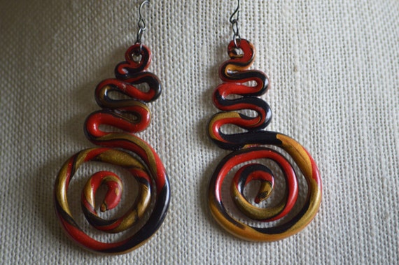 Items similar to BEAUTIFUL CLAY black gold red on Etsy
