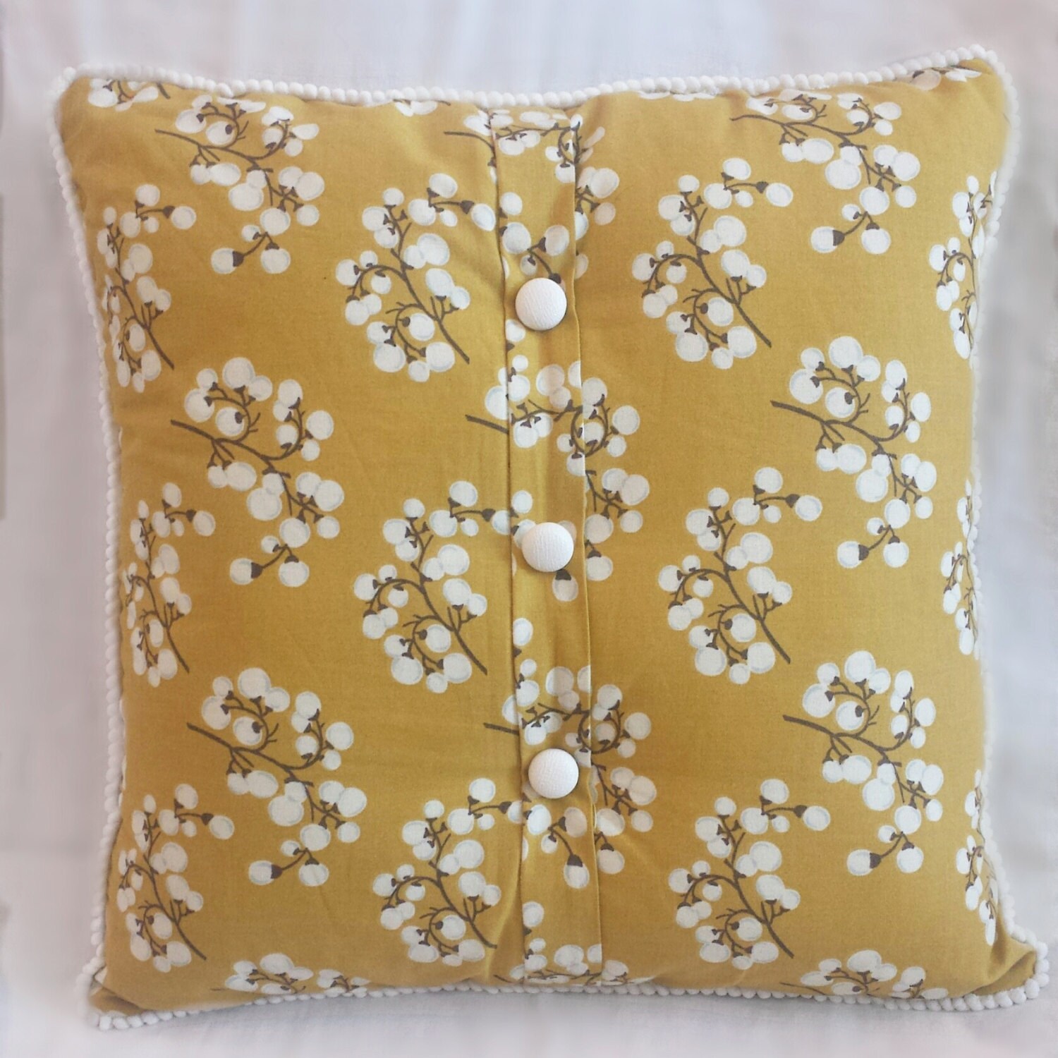 decorative pillow/yellow pillow/floral print/buttons/yellow