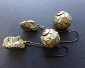 The Million-Crested Sun. Gold texture faceted polymer art beads with chunky pyrite. Rustic earrings.