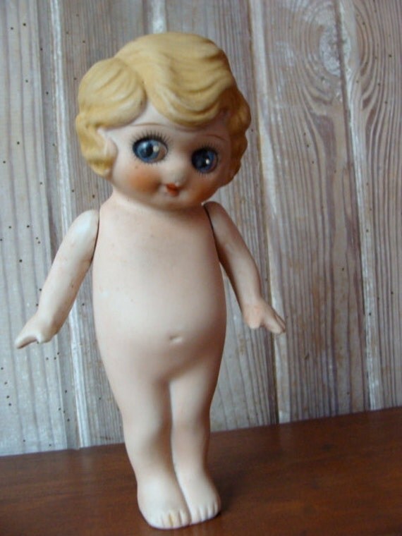 Antique Hand painted Bisque Jointed Kewpie Doll with
