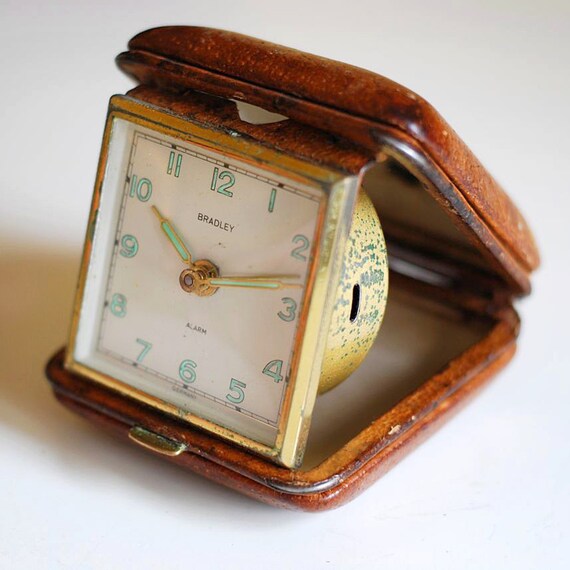Items similar to vintage travel alarm clock in leather case, Bentley