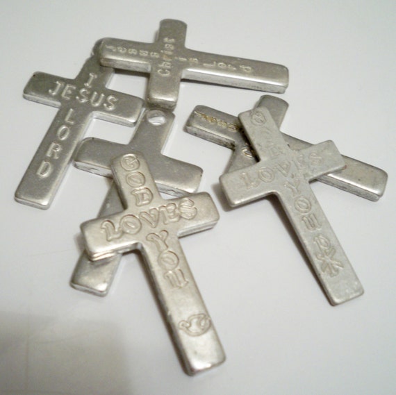 Collection of aluminum crosses Pendant crosses Pocket