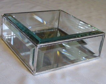 A clear beveled glass display box 6 x 6 x 2 inches for your treasures, memories, and keepsakes