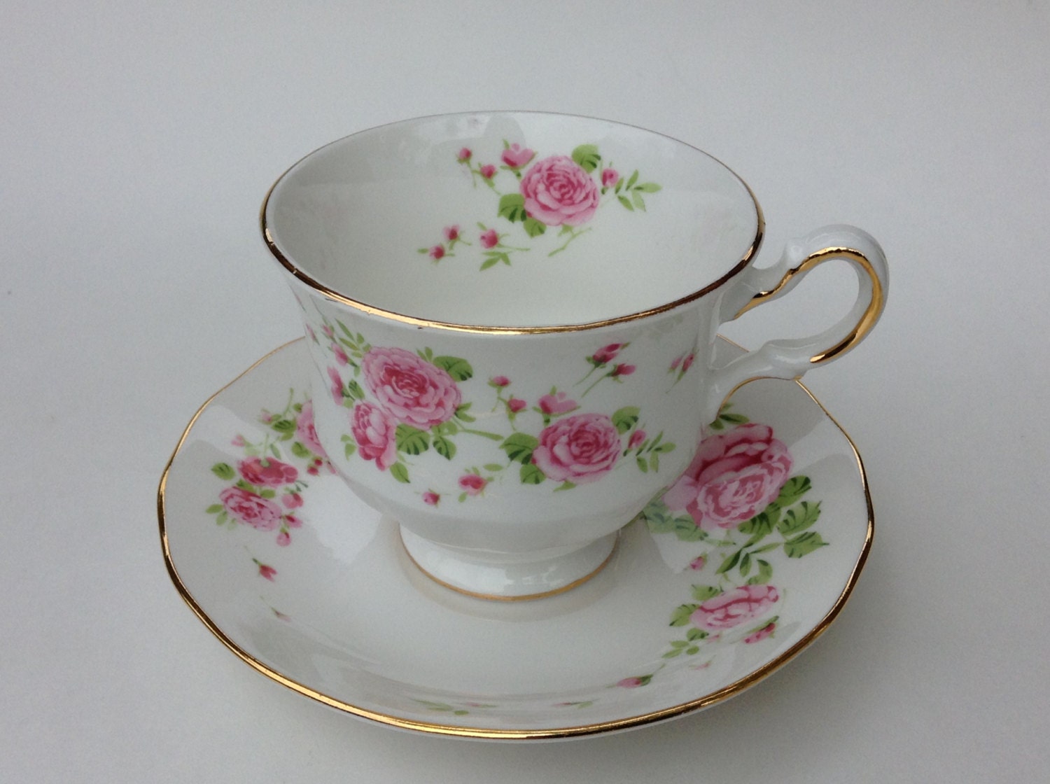 Tea Cup and Saucer Made Exclusively for Avon Pink by dishinit