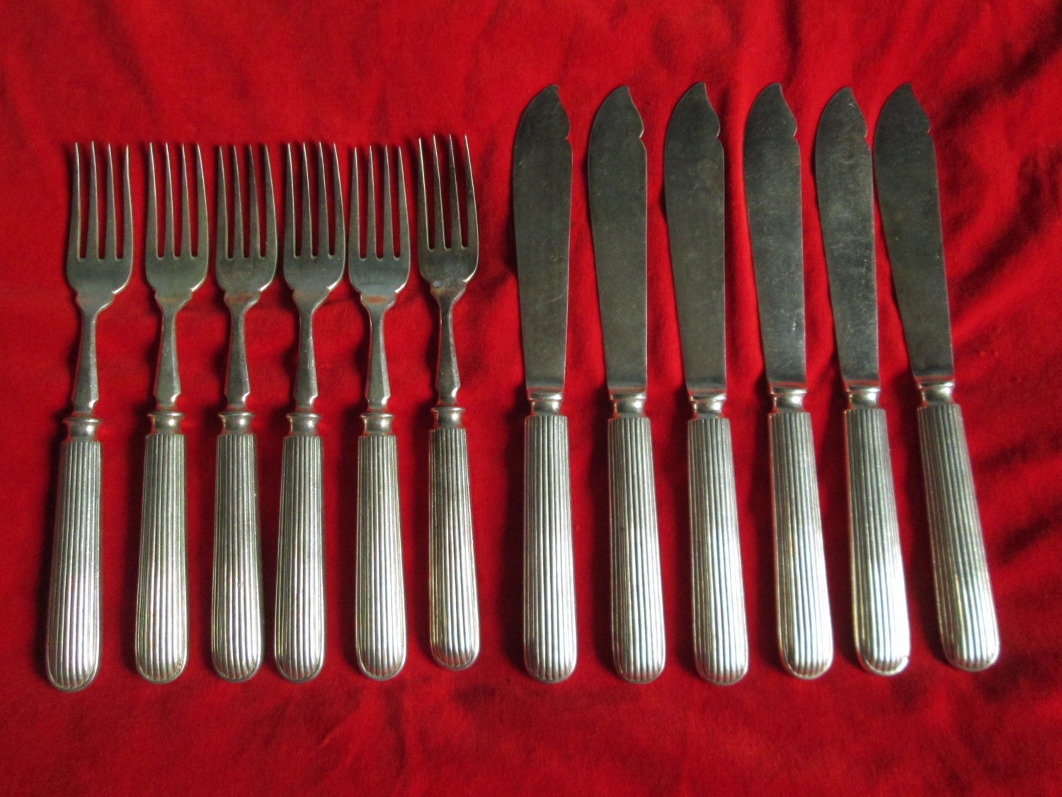 6 knives and Forks by Elkington