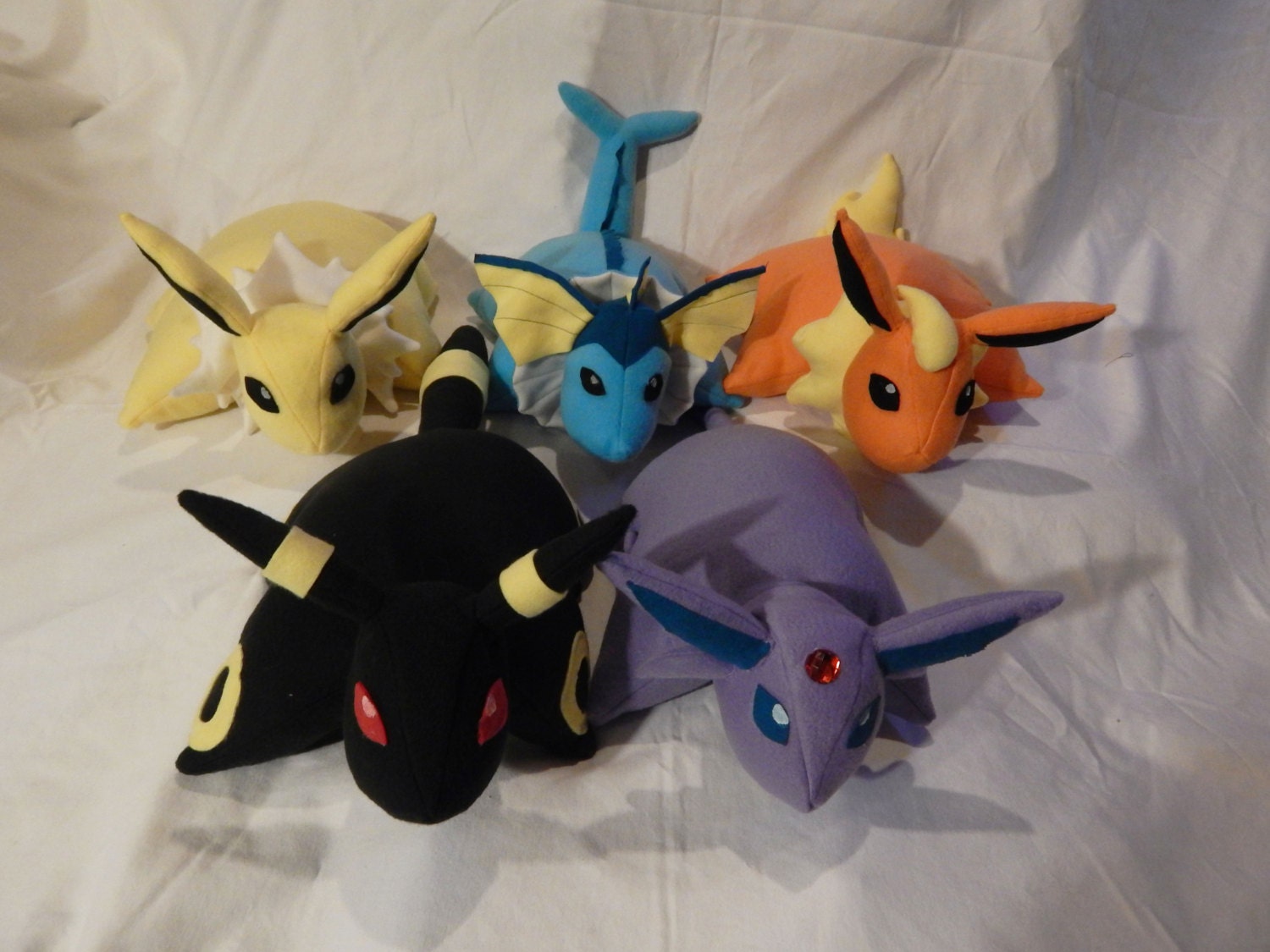 sleeping eeveelution plush