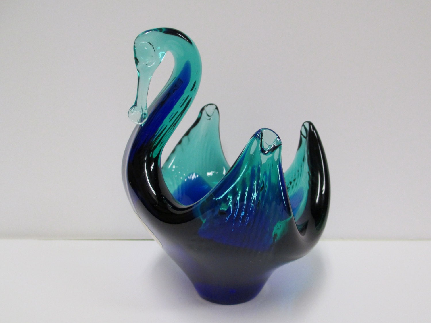 blue glass swan figurine