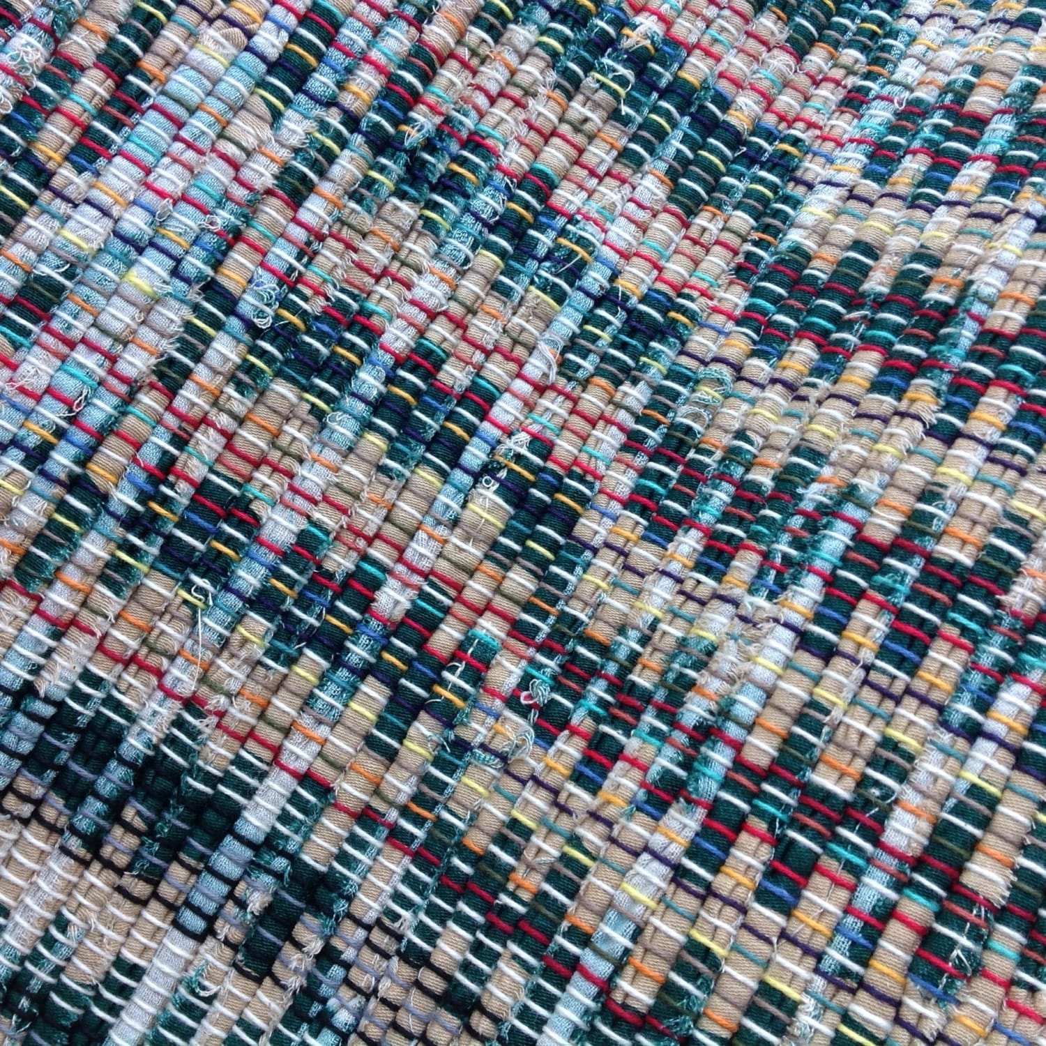 Green and tan rag rug 38 x 26 hand woven light and