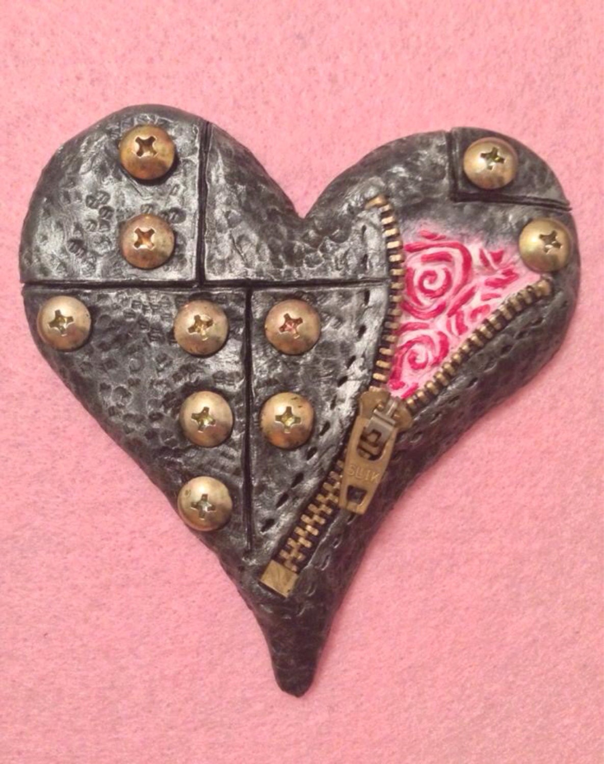 Handmade steampunk framed polymer clay heart with zip and metal screws pink and black