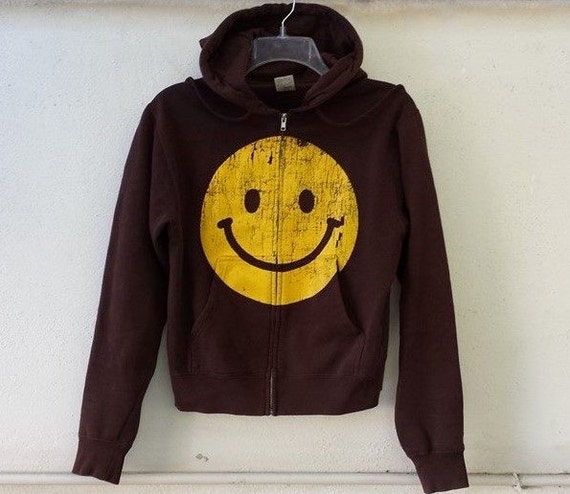 brown hoodie with smiley face