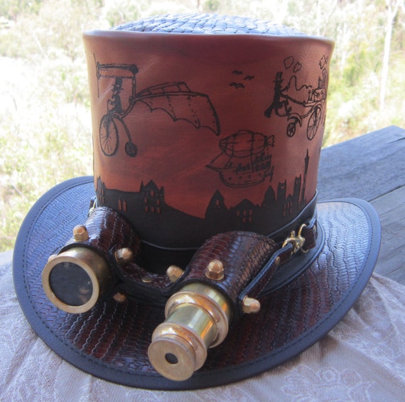 Hand made fantasy etched unique Steampunk Top Hat with golden Aviator goggles by Cobbcoleather steampunk buy now online