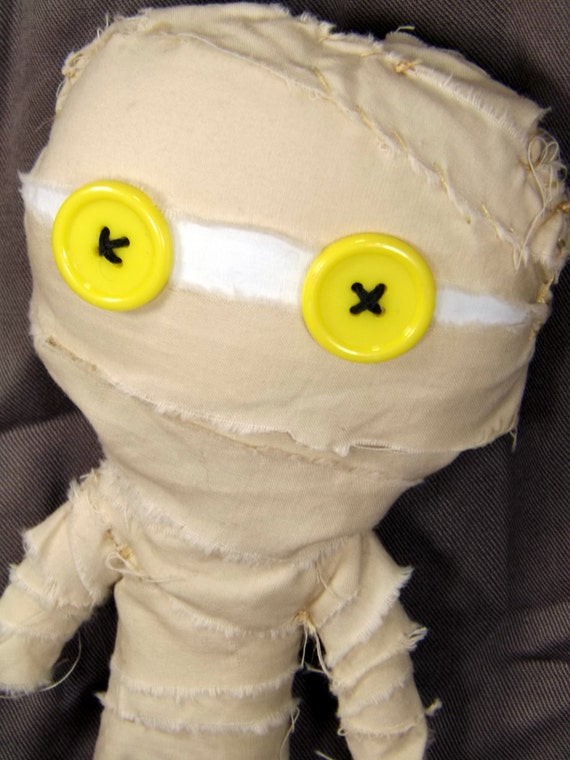 rag doll with button eyes