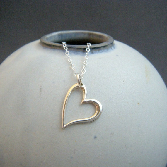 small heart necklace. sterling silver open slanted heart.