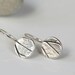 Silver leaf earrings, round disc earrings with leaf imprint in sterling silver