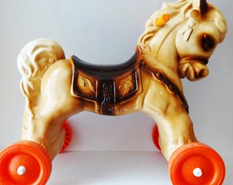 rolling riding horse toy