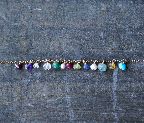 Birthstones add a genuine gemstone to your current order