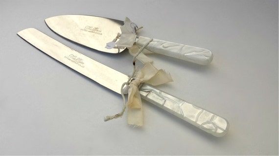  Wedding  cake  serving set  by Treasure  Masters  Sheffield Steel