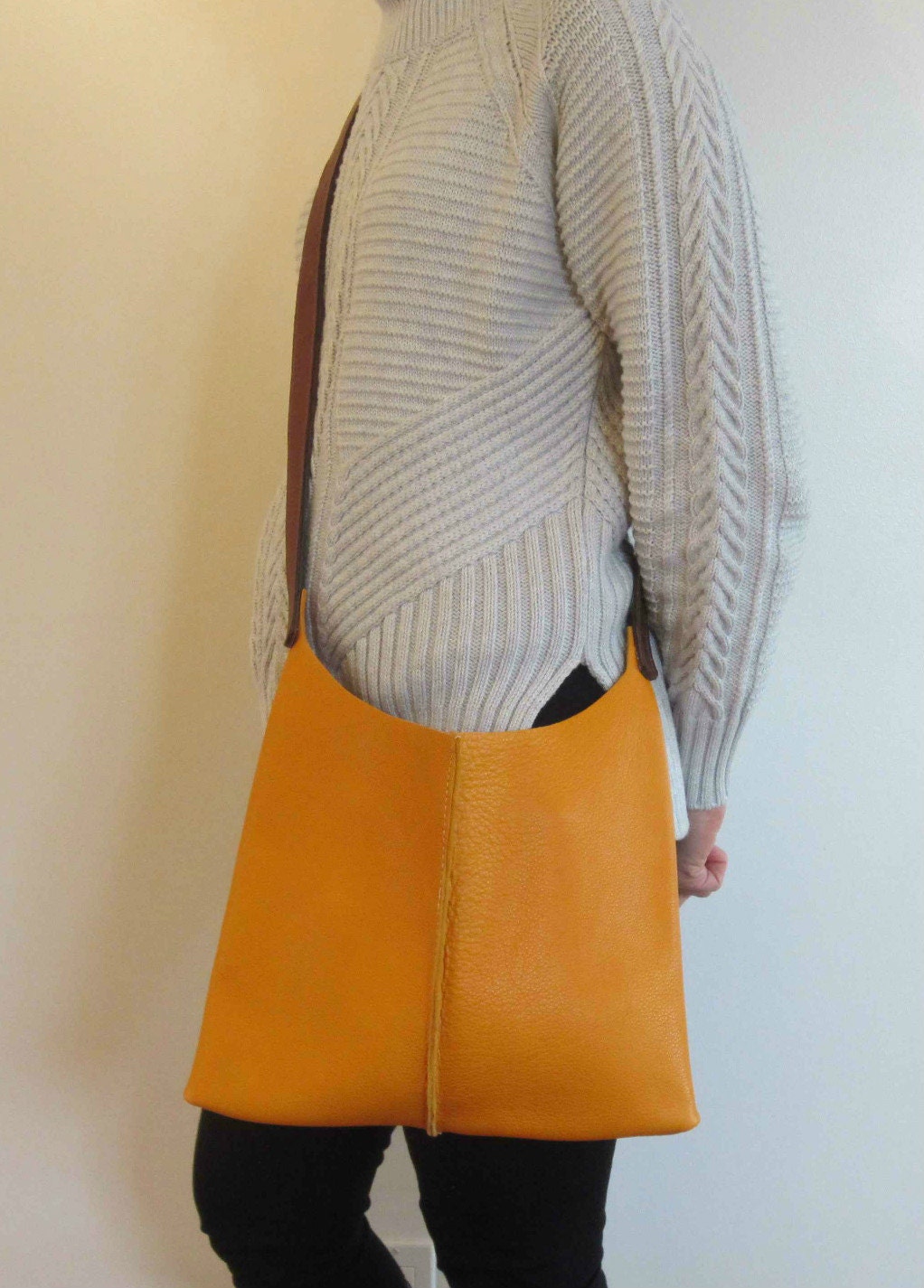 orange leather cross body bag