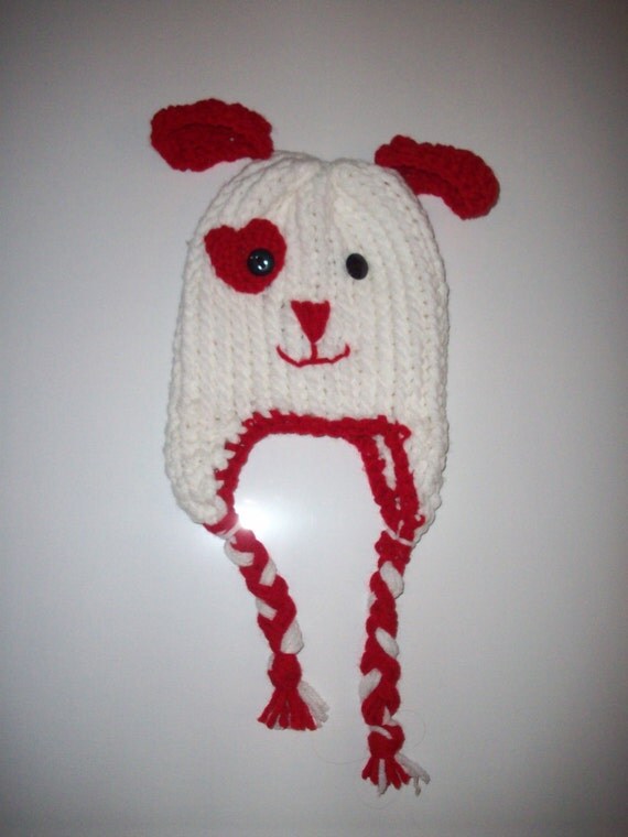 Items similar to Loom Knitted Puppy Dog Hat with Ear Flaps, and Tassels