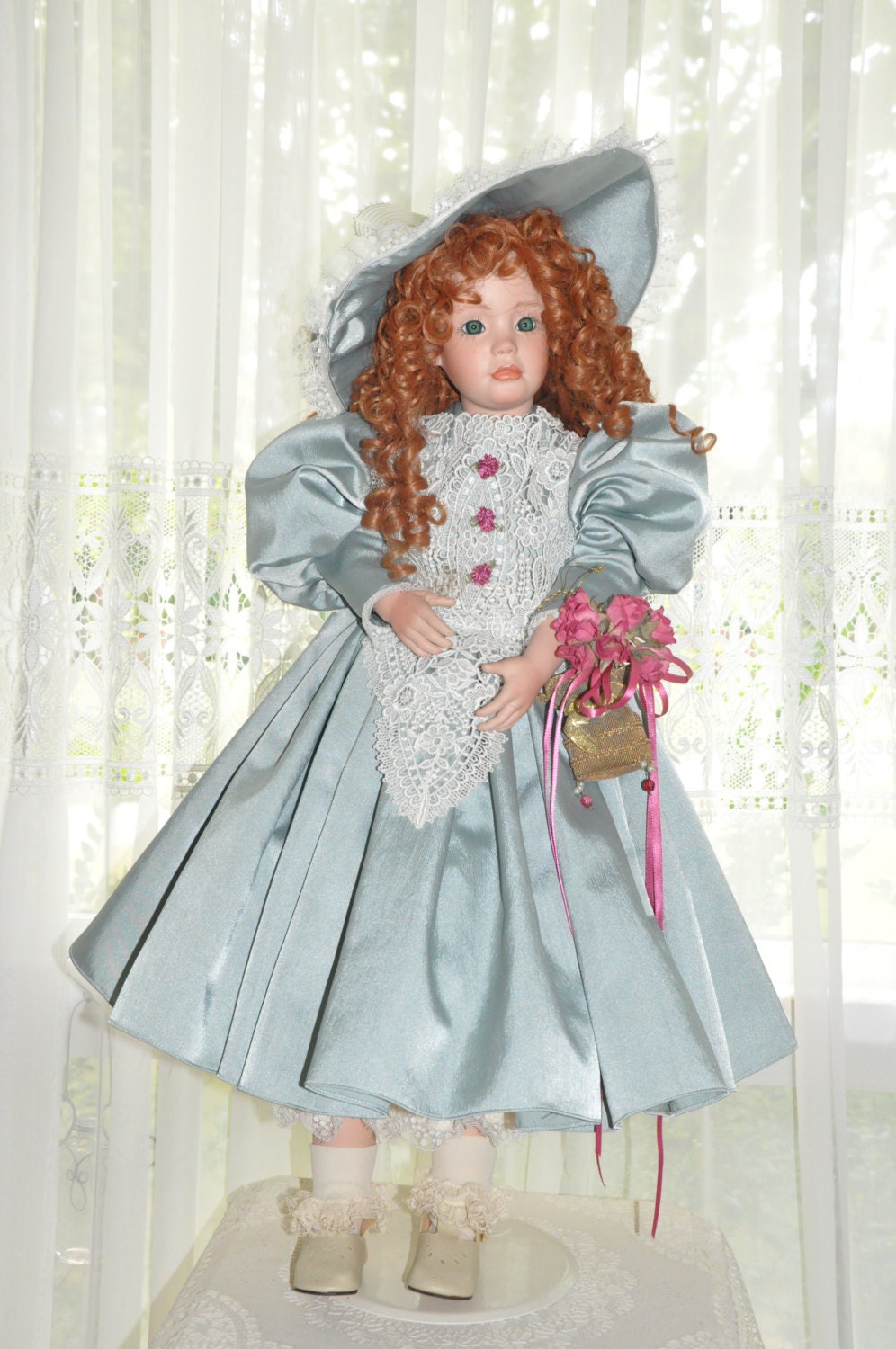 porcelain doll with cloth body