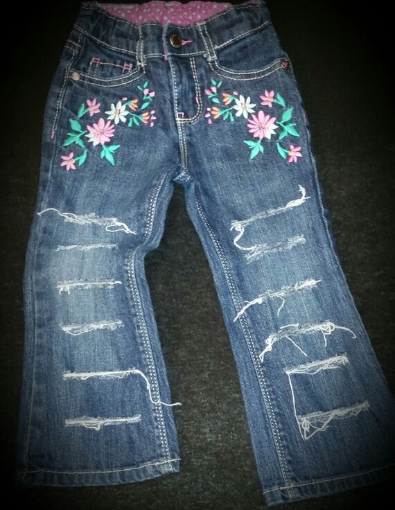Items similar to Size 2T Girls Distressed and Floral Print Denim Jeans