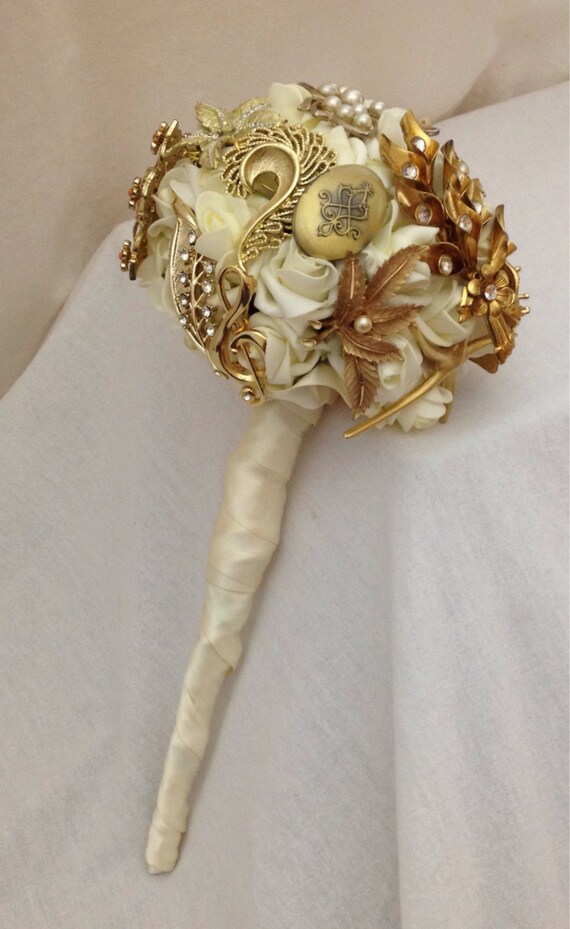 Vintage brooch bouquet in golds and ivory