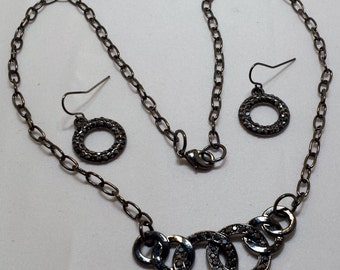 Black jeweled necklace and earring set.