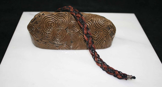 Celtic leather in black and browns