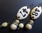 Order and Harmony. Rustic assemblage art earrings with white enameled plaques. 47/48