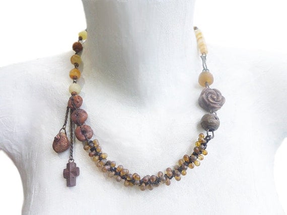 What We Try to Say. Chunky rustic asymmetrical assemblage necklace in shades of golden amber.