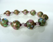 Vintage art glass bead and gemstone bracelet, green stylized floral art glass, genuine garnets pink amethyst, Let Loose Jewelry, under 100