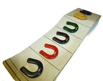 Vintage Bakelite Buttons. Figural Horseshoes. Still on Sample Card. 1940s.