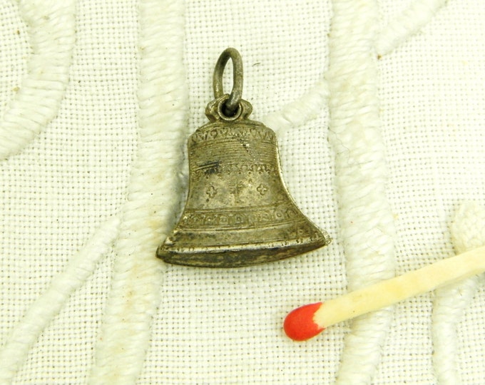 Vintage French Religious Pendant in the Shape of a Bell which Slides Open and inside is an Image of Christ and Monmartre / Religious Jewelry Vintage French Religious Pendant in the Shape of a Bell which Slides Open and inside is an Image of Christ and Monmartre / Religious Jewelry