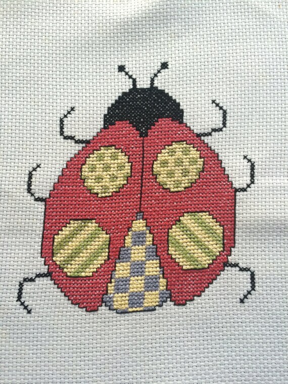 Ladybug completed cross stitch by DandelionDivisions on Etsy